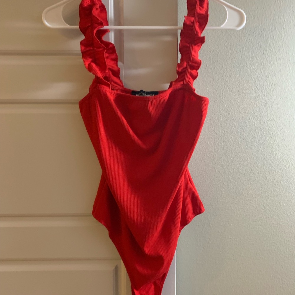 NWT. Kittenish riffled blouse/onsie